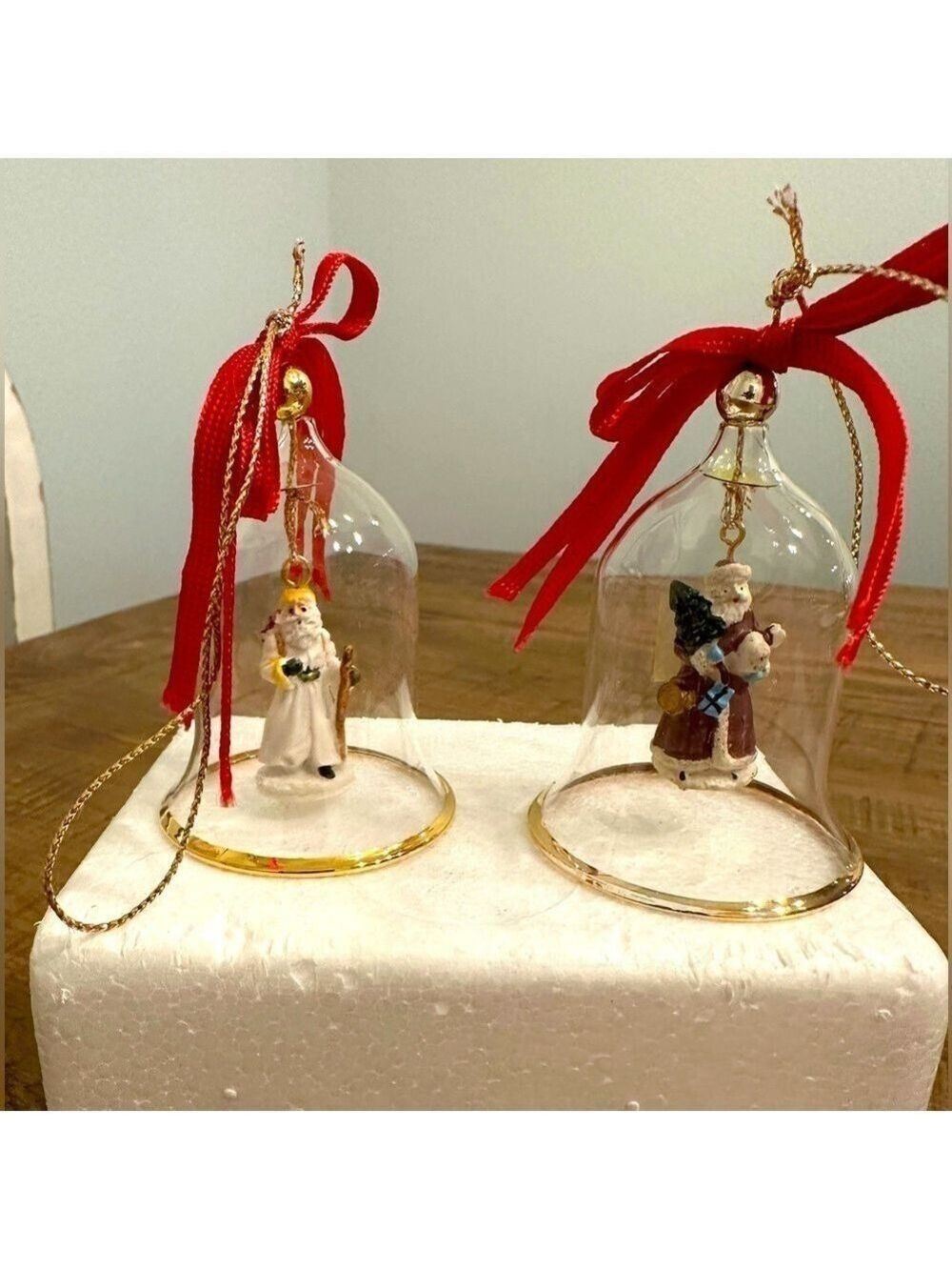 Set of 2 Crystal Bell Ornaments with Real Gold Trim. Accented with red Ribbon
